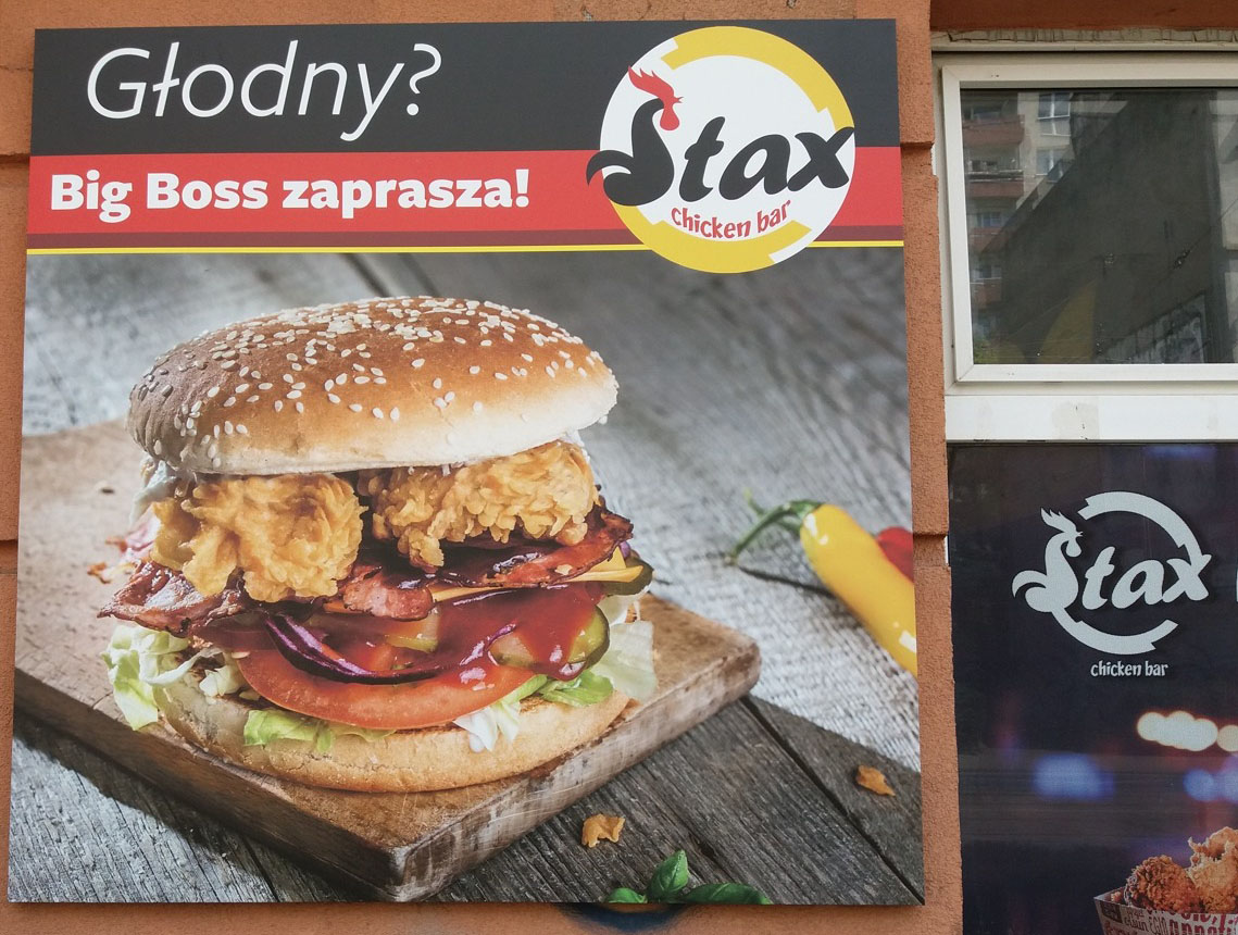 Wydruk wielkoformatowy na tablicy reklamowej — realizacja PB Reklama